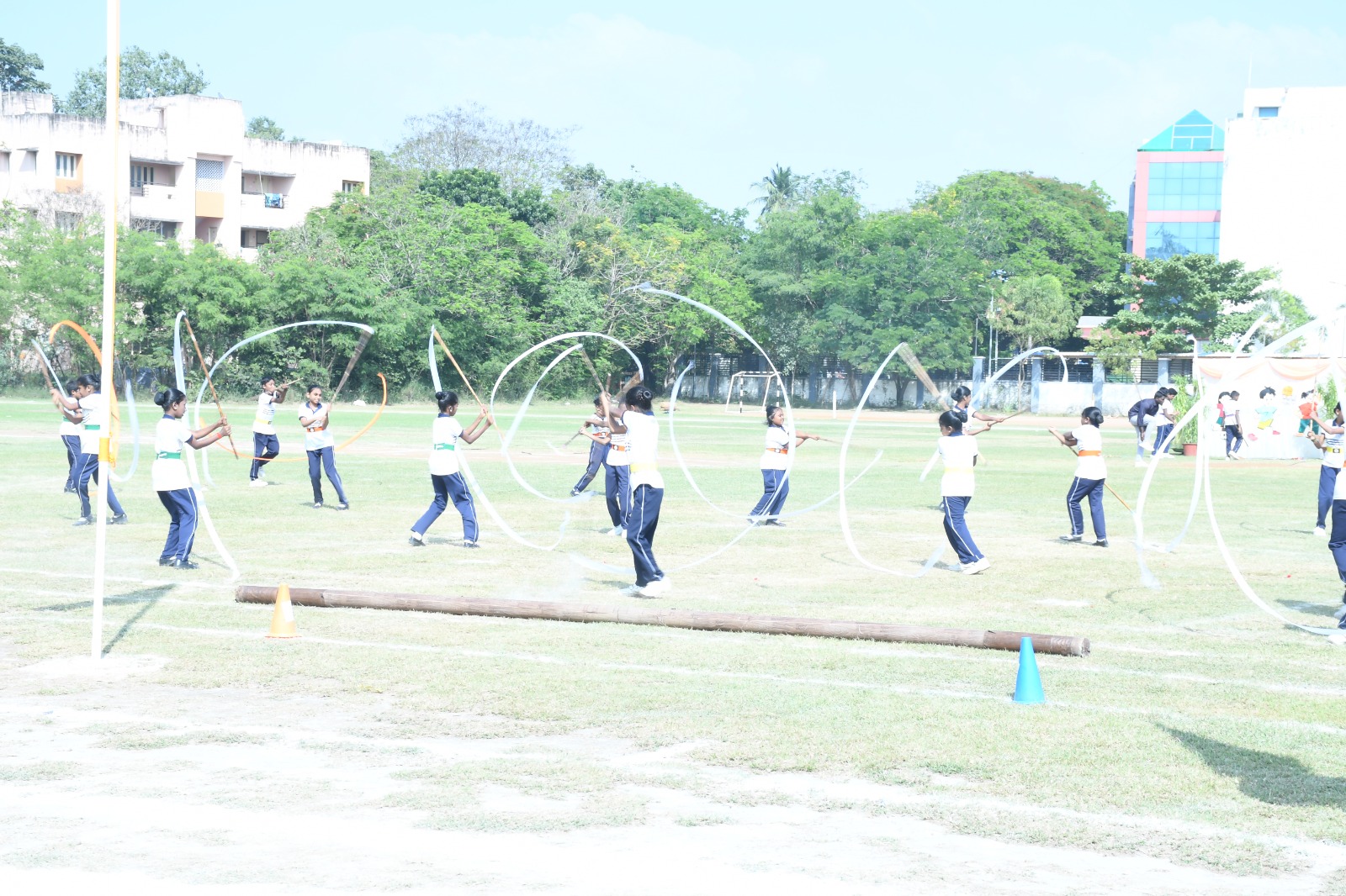 Students practicing traditional Silambam martial arts